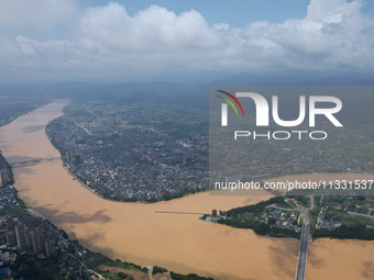 The water level in the Rongan county section of the Pearl River is rising and becoming turbid after a rainstorm in Liuzhou, China, on June 1...