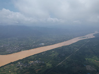 The water level in the Rongan county section of the Pearl River is rising and becoming turbid after a rainstorm in Liuzhou, China, on June 1...