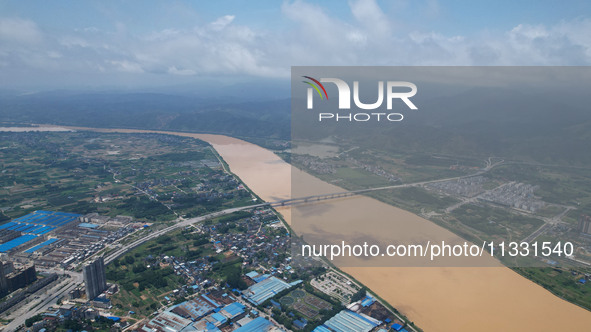 The water level in the Rongan county section of the Pearl River is rising and becoming turbid after a rainstorm in Liuzhou, China, on June 1...