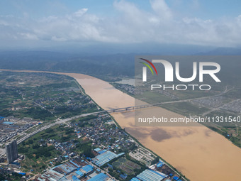 The water level in the Rongan county section of the Pearl River is rising and becoming turbid after a rainstorm in Liuzhou, China, on June 1...