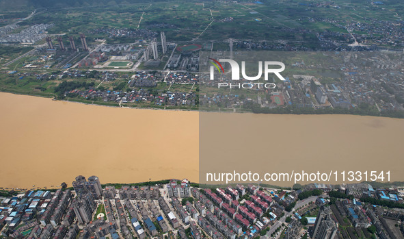 The water level in the Rongan county section of the Pearl River is rising and becoming turbid after a rainstorm in Liuzhou, China, on June 1...