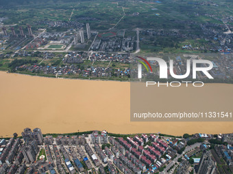 The water level in the Rongan county section of the Pearl River is rising and becoming turbid after a rainstorm in Liuzhou, China, on June 1...