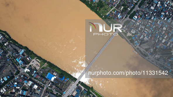 The water level in the Rongan county section of the Pearl River is rising and becoming turbid after a rainstorm in Liuzhou, China, on June 1...