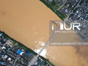 The water level in the Rongan county section of the Pearl River is rising and becoming turbid after a rainstorm in Liuzhou, China, on June 1...