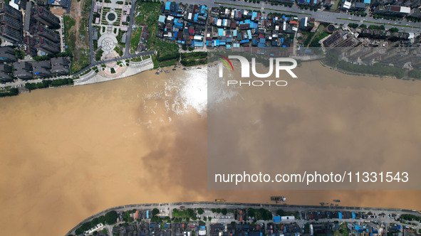 The water level in the Rongan county section of the Pearl River is rising and becoming turbid after a rainstorm in Liuzhou, China, on June 1...