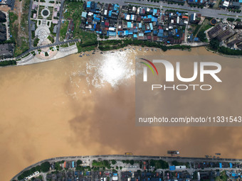 The water level in the Rongan county section of the Pearl River is rising and becoming turbid after a rainstorm in Liuzhou, China, on June 1...