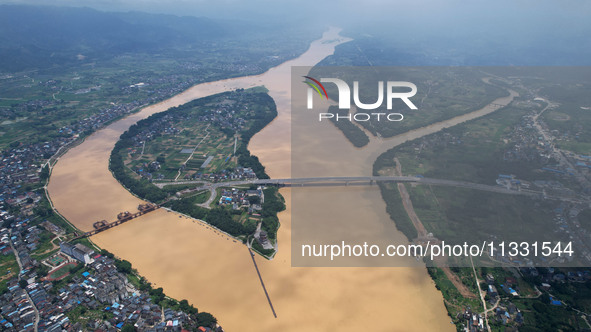 The water level in the Rongan county section of the Pearl River is rising and becoming turbid after a rainstorm in Liuzhou, China, on June 1...