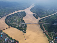 The water level in the Rongan county section of the Pearl River is rising and becoming turbid after a rainstorm in Liuzhou, China, on June 1...