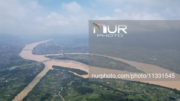 The water level in the Rongan county section of the Pearl River is rising and becoming turbid after a rainstorm in Liuzhou, China, on June 1...