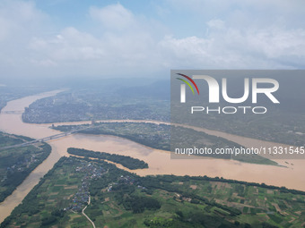 The water level in the Rongan county section of the Pearl River is rising and becoming turbid after a rainstorm in Liuzhou, China, on June 1...