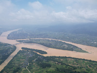 The water level in the Rongan county section of the Pearl River is rising and becoming turbid after a rainstorm in Liuzhou, China, on June 1...