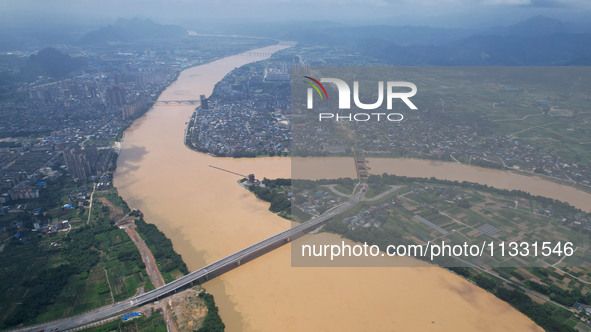 The water level in the Rongan county section of the Pearl River is rising and becoming turbid after a rainstorm in Liuzhou, China, on June 1...