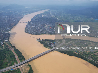 The water level in the Rongan county section of the Pearl River is rising and becoming turbid after a rainstorm in Liuzhou, China, on June 1...