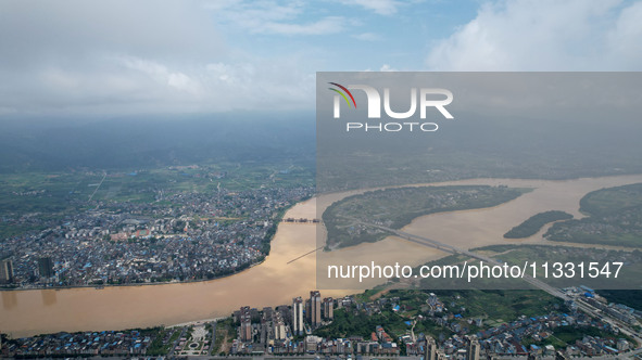 The water level in the Rongan county section of the Pearl River is rising and becoming turbid after a rainstorm in Liuzhou, China, on June 1...