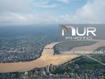 The water level in the Rongan county section of the Pearl River is rising and becoming turbid after a rainstorm in Liuzhou, China, on June 1...