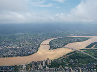 The water level in the Rongan county section of the Pearl River is rising and becoming turbid after a rainstorm in Liuzhou, China, on June 1...