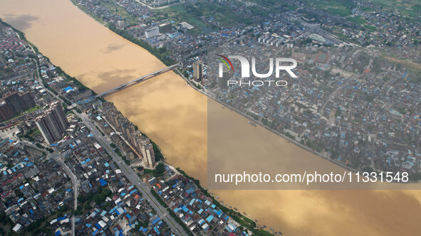 The water level in the Rongan county section of the Pearl River is rising and becoming turbid after a rainstorm in Liuzhou, China, on June 1...