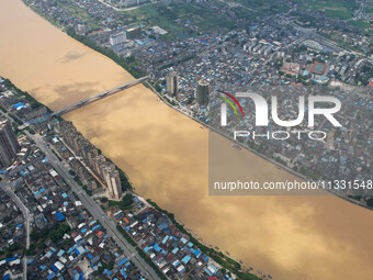 The water level in the Rongan county section of the Pearl River is rising and becoming turbid after a rainstorm in Liuzhou, China, on June 1...