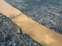 The water level in the Rongan county section of the Pearl River is rising and becoming turbid after a rainstorm in Liuzhou, China, on June 1...