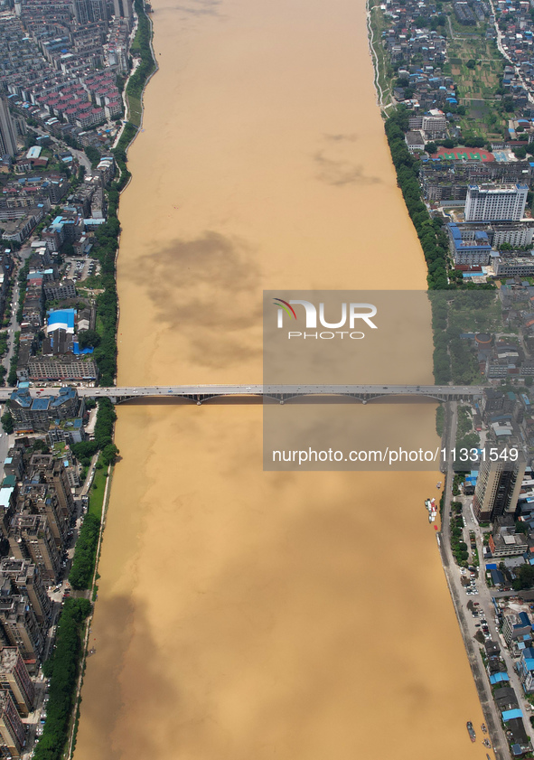 The water level in the Rongan county section of the Pearl River is rising and becoming turbid after a rainstorm in Liuzhou, China, on June 1...