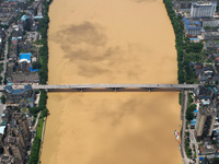 The water level in the Rongan county section of the Pearl River is rising and becoming turbid after a rainstorm in Liuzhou, China, on June 1...