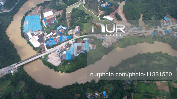 The water level in the Rongan county section of the Pearl River is rising and becoming turbid after a rainstorm in Liuzhou, China, on June 1...