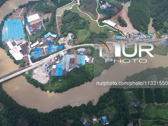 The water level in the Rongan county section of the Pearl River is rising and becoming turbid after a rainstorm in Liuzhou, China, on June 1...