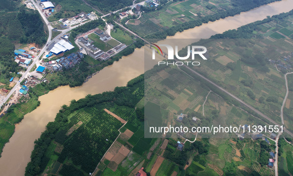 The water level in the Rongan county section of the Pearl River is rising and becoming turbid after a rainstorm in Liuzhou, China, on June 1...