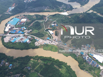 The water level in the Rongan county section of the Pearl River is rising and becoming turbid after a rainstorm in Liuzhou, China, on June 1...