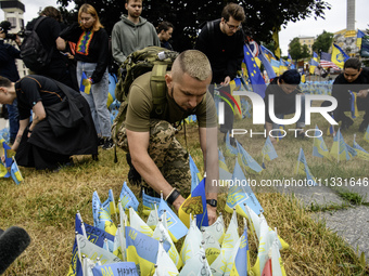 LGBT representatives are honoring the memory of Artur Snitkus, a representative of Ukraine's queer community and serviceman, and all Ukraini...