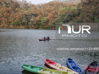 People are kayaking along Sattal Lake in Sattal (Sat Tal), Uttarakhand, India, on April 20, 2024. (