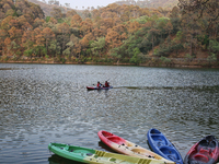 People are kayaking along Sattal Lake in Sattal (Sat Tal), Uttarakhand, India, on April 20, 2024. (