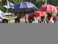 Youth from Saint George Orthodox Church are taking part in a procession in Kalathoor, Kerala, India, on April 05, 2024. (