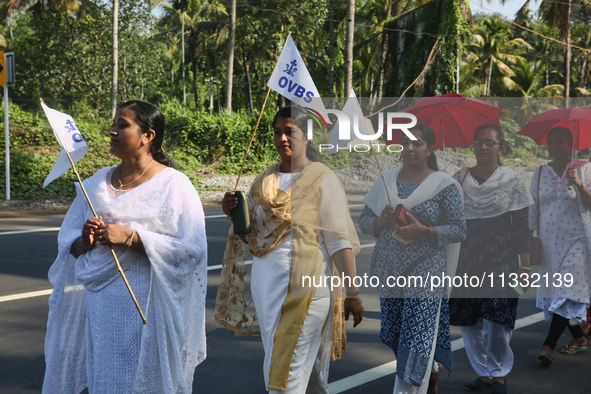 Women from Saint George Orthodox Church are taking part in a procession in Kalathoor, Kerala, India, on April 05, 2024. 