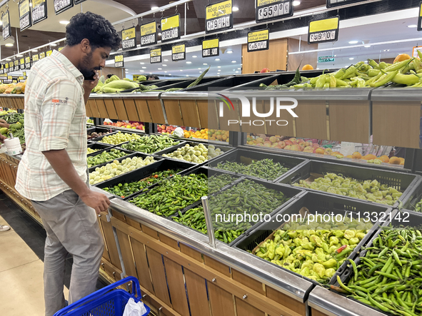 Shoppers are purchasing groceries at the Pothy's market in Thiruvananthapuram (Trivandrum), Kerala, India, on April 08, 2024. Inflation in I...