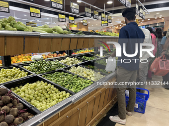 Shoppers are purchasing groceries at the Pothy's market in Thiruvananthapuram (Trivandrum), Kerala, India, on April 08, 2024. Inflation in I...