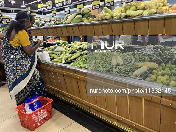 Shoppers are purchasing groceries at the Pothy's market in Thiruvananthapuram (Trivandrum), Kerala, India, on April 08, 2024. Inflation in I...