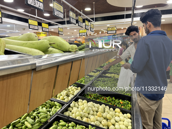 Shoppers are purchasing groceries at the Pothy's market in Thiruvananthapuram (Trivandrum), Kerala, India, on April 08, 2024. Inflation in I...