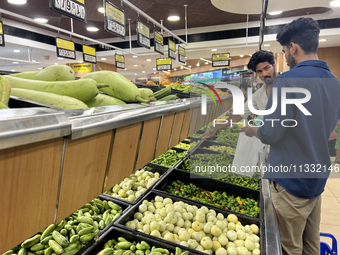 Shoppers are purchasing groceries at the Pothy's market in Thiruvananthapuram (Trivandrum), Kerala, India, on April 08, 2024. Inflation in I...