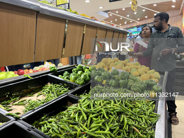 Shoppers are purchasing groceries at the Pothy's market in Thiruvananthapuram (Trivandrum), Kerala, India, on April 08, 2024. Inflation in I...