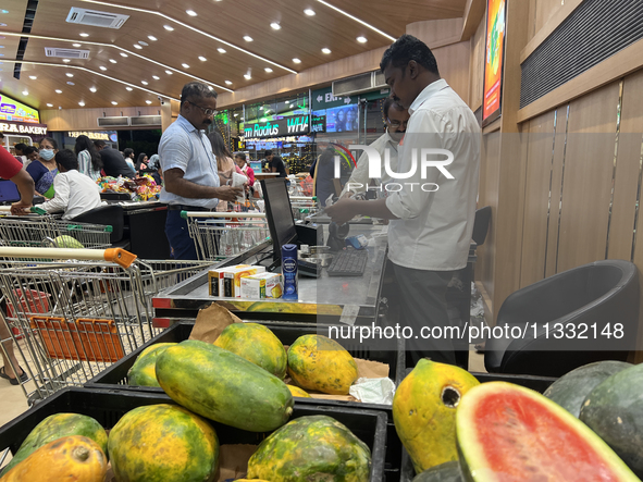 Shoppers are purchasing groceries at the Pothy's market in Thiruvananthapuram (Trivandrum), Kerala, India, on April 08, 2024. Inflation in I...