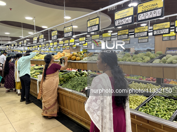 Shoppers are purchasing groceries at the Pothy's market in Thiruvananthapuram (Trivandrum), Kerala, India, on April 08, 2024. Inflation in I...