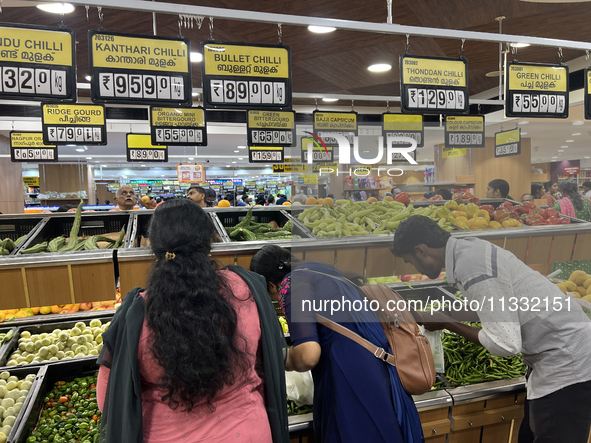 Shoppers are purchasing groceries at the Pothy's market in Thiruvananthapuram (Trivandrum), Kerala, India, on April 08, 2024. Inflation in I...