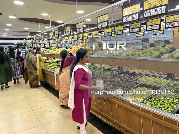 Shoppers are purchasing groceries at the Pothy's market in Thiruvananthapuram (Trivandrum), Kerala, India, on April 08, 2024. Inflation in I...