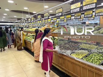 Shoppers are purchasing groceries at the Pothy's market in Thiruvananthapuram (Trivandrum), Kerala, India, on April 08, 2024. Inflation in I...