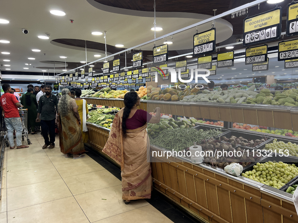 Shoppers are purchasing groceries at the Pothy's market in Thiruvananthapuram (Trivandrum), Kerala, India, on April 08, 2024. Inflation in I...