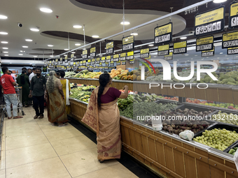 Shoppers are purchasing groceries at the Pothy's market in Thiruvananthapuram (Trivandrum), Kerala, India, on April 08, 2024. Inflation in I...