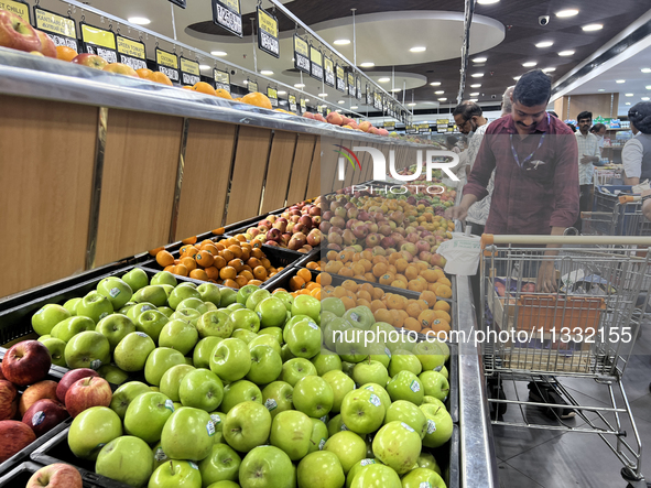 Shoppers are purchasing groceries at the Pothy's market in Thiruvananthapuram (Trivandrum), Kerala, India, on April 08, 2024. Inflation in I...