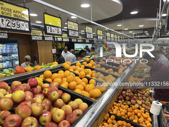 Shoppers are purchasing groceries at the Pothy's market in Thiruvananthapuram (Trivandrum), Kerala, India, on April 08, 2024. Inflation in I...