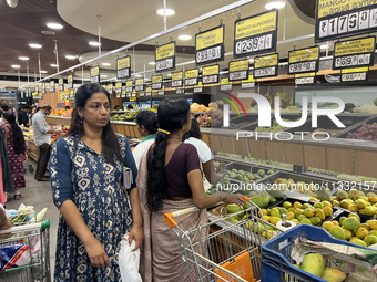 Shoppers are purchasing groceries at the Pothy's market in Thiruvananthapuram (Trivandrum), Kerala, India, on April 08, 2024. Inflation in I...